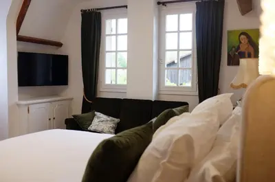 Un ou plusieurs lits dans un hébergement de l'établissement Le Clos Morin - Chambres d'hôtes