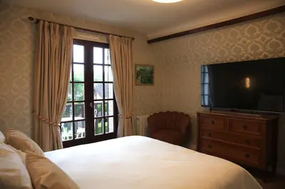 Télévision ou salle de divertissement dans l'établissement Le Clos Morin - Chambres d'hôtes