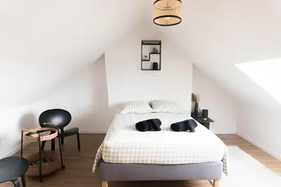 Un ou plusieurs lits dans un hébergement de l'établissement Appartement confort à Rouen