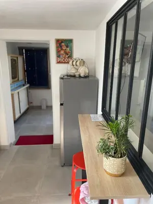 Cuisine ou kitchenette dans l'établissement Cozy vintage BNB house