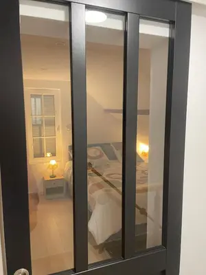 Un ou plusieurs lits dans un hébergement de l'établissement Cozy vintage BNB house