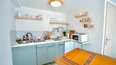 Cuisine ou kitchenette dans l'établissement La Parenthèse Impressionniste
