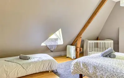 Un ou plusieurs lits dans un hébergement de l'établissement Maison Vue Campagne