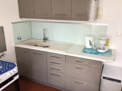 Cuisine ou kitchenette dans l'établissement Sara's Home 24