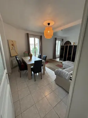 Un ou plusieurs lits dans un hébergement de l'établissement Apartment - 1min to train station - 13min to Paris