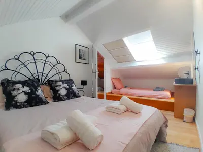 Un ou plusieurs lits dans un hébergement de l'établissement Duplex de Charme avec Bureau - Face Gare RER A