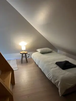 Un ou plusieurs lits dans un hébergement de l'établissement Appart Duplex Proche Centre