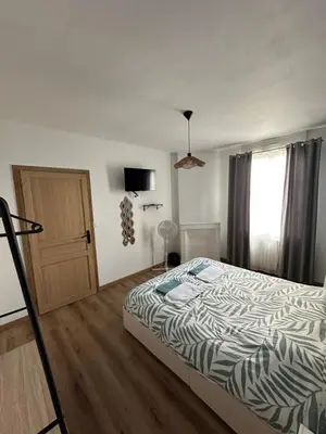 Un ou plusieurs lits dans un hébergement de l'établissement La maison des amis
