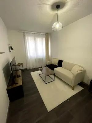 Coin salon dans l'établissement Apartment 2