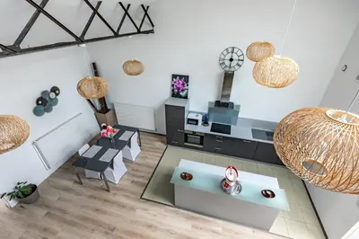 Coin salon dans l'établissement Le Faubourg Saint Martin Loft and Spa 1