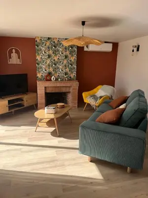 Coin salon dans l'établissement Chez Colette- Maison avec jardin