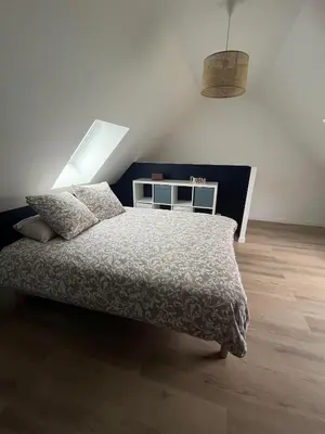 Un ou plusieurs lits dans un hébergement de l'établissement Chez Colette- Maison avec jardin