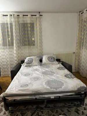Un ou plusieurs lits dans un hébergement de l'établissement Apartment in Cergy Prefecture