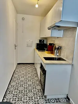 Cuisine ou kitchenette dans l'établissement Apartment in Cergy Prefecture