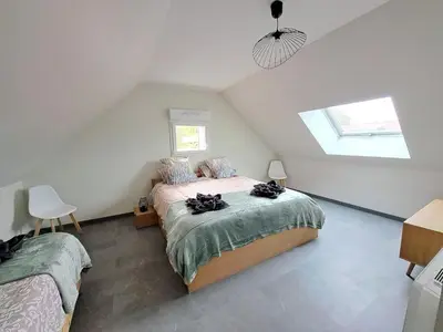Un ou plusieurs lits dans un hébergement de l'établissement Gîte Ô Bo Bois