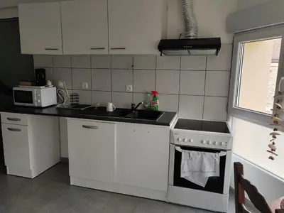 Cuisine ou kitchenette dans l'établissement studio près de cergy calme