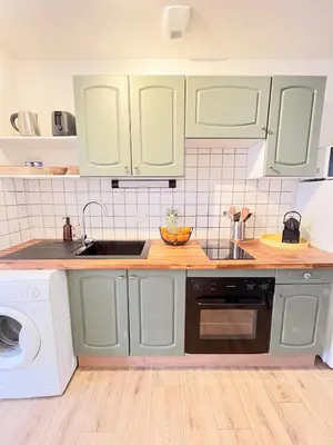 Cuisine ou kitchenette dans l'établissement Les horizons de Jules