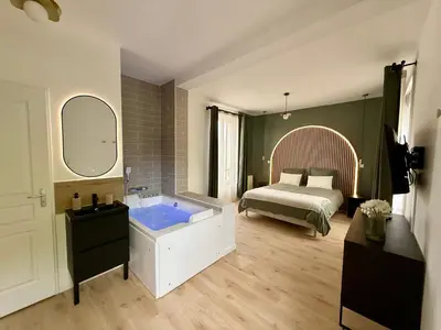 Un ou plusieurs lits dans un hébergement de l'établissement Évasion spa près de Giverny