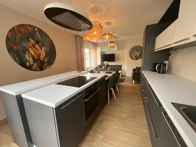 Cuisine ou kitchenette dans l'établissement Home Design