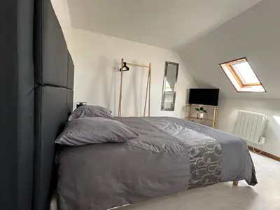 Un ou plusieurs lits dans un hébergement de l'établissement Appartement Mers Les Bains