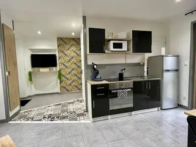 Cuisine ou kitchenette dans l'établissement La Pause Bain & Nature