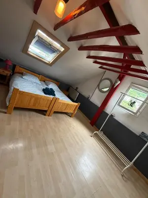 Un ou plusieurs lits dans un hébergement de l'établissement Maison de ville cosy pour 4 personnes