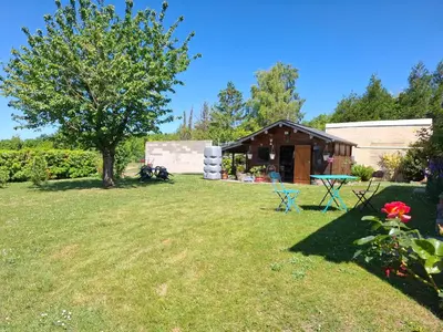 Jardin de l'établissement Chambre chez l habitant à 10 mn de aéroport