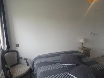 Un ou plusieurs lits dans un hébergement de l'établissement Maison complètement rénovée 3 chambres