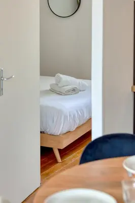 Un ou plusieurs lits dans un hébergement de l'établissement Petit Castel - charmant T2 de 39m au cœur de Rouen Rue du Gros-Horloge !