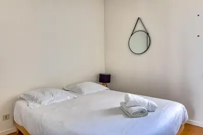 Un ou plusieurs lits dans un hébergement de l'établissement Petit Castel - charmant T2 de 39m au cœur de Rouen Rue du Gros-Horloge !