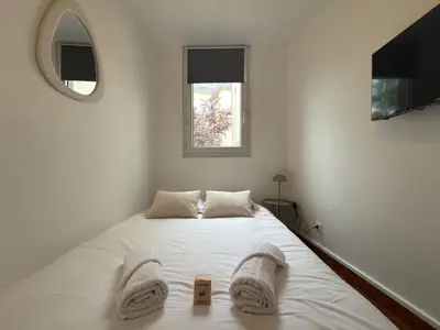 Un ou plusieurs lits dans un hébergement de l'établissement Rouen Gare - Petit studio cosy - Climatisation