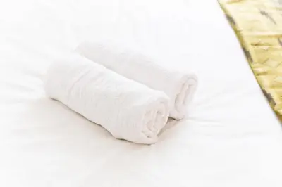 Un ou plusieurs lits dans un hébergement de l'établissement TYKO HOME Sérénité & Confort proche Paris