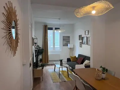 Coin salon dans l'établissement Maison cosy et calme à proximité de la gare