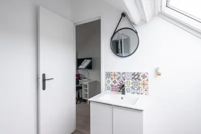 Cuisine ou kitchenette dans l'établissement Studio moderne proche centre ville & Gare