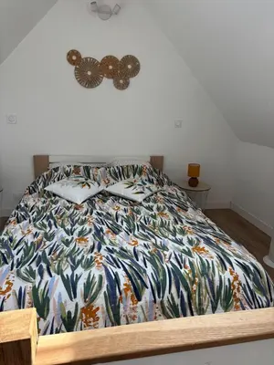 Un ou plusieurs lits dans un hébergement de l'établissement Grands Jardins Cottage Charming countryside
