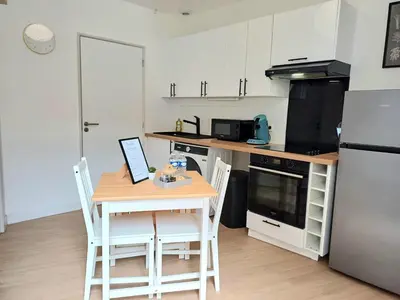 Cuisine ou kitchenette dans l'établissement Le Clos Carnot 3 - Proche Commodités