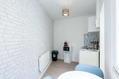 Cuisine ou kitchenette dans l'établissement Studio tout équipé proche centre ville & gare
