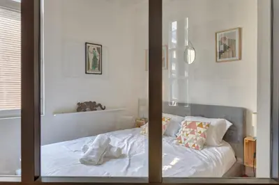 Un ou plusieurs lits dans un hébergement de l'établissement Ana charmant 2 pièces au cœur du centre historique de Rouen