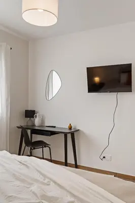 Télévision ou salle de divertissement dans l'établissement Maison neuve haut de gamme - 4 chambres, terrasse, jardin, parking