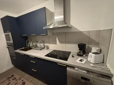 Cuisine ou kitchenette dans l'établissement dunes dorees - chambre privee