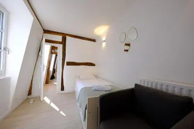 Un ou plusieurs lits dans un hébergement de l'établissement Rouen centre - Duplex cosy pour 5 personnes