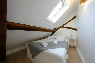 Un ou plusieurs lits dans un hébergement de l'établissement Rouen centre - Duplex cosy pour 5 personnes