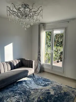 Coin salon dans l'établissement Maison Serenity Domont Retreat