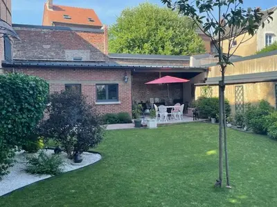 Jardin de l'établissement STUDIO INDUSTRIEL chic
