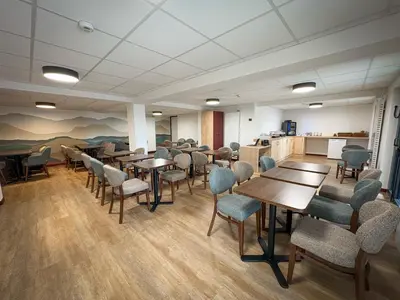 Coin salon dans l'établissement Hôtel du Golf De Jumièges