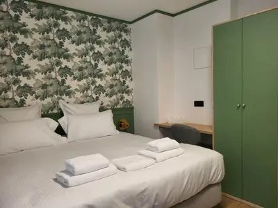 Un ou plusieurs lits dans un hébergement de l'établissement Hôtel du Golf De Jumièges