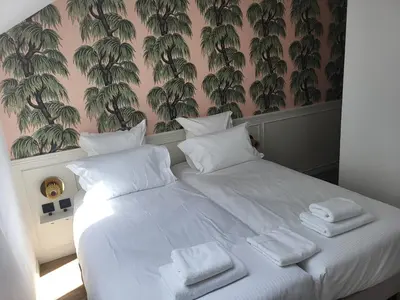 Un ou plusieurs lits dans un hébergement de l'établissement Hôtel du Golf De Jumièges