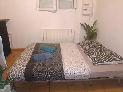Un ou plusieurs lits dans un hébergement de l'établissement Nouveau studio 1 d'Amiens