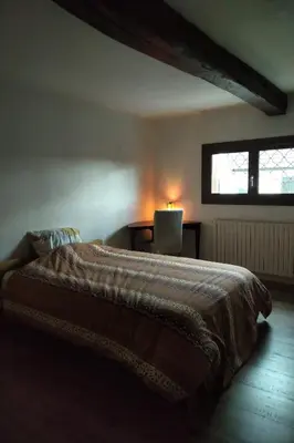 Un ou plusieurs lits dans un hébergement de l'établissement Chambre double ou twin au bord de Seine
