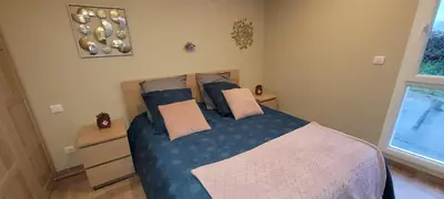 Un ou plusieurs lits dans un hébergement de l'établissement Gîte Les Deux Eaux